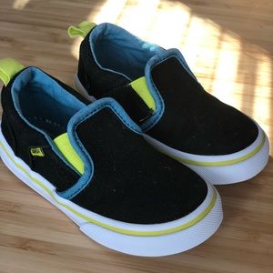 Black and Neon slip-on Vans T7